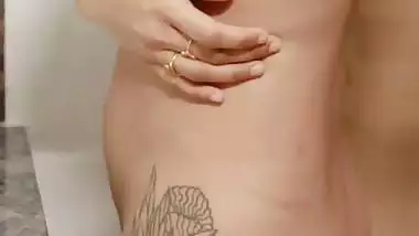 Kerala desi nude model stares at her naked body in a mirror