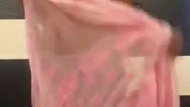 Shapely boobed desi bhabhi stripping saree