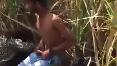 Indian outdoor sex of a guy and his GF in the bushes