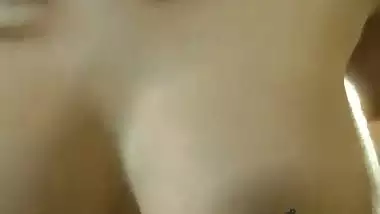 Bollywood actress Sunny Leone squeezes her juicy boobs